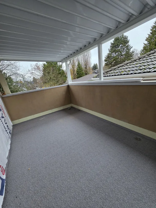 Finished vinyl membrane rooftop deck rebuild by Valart Solutions