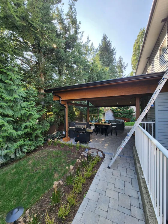 Finished stained cedar patio cover in Langley built from scratch by Valart Solutions